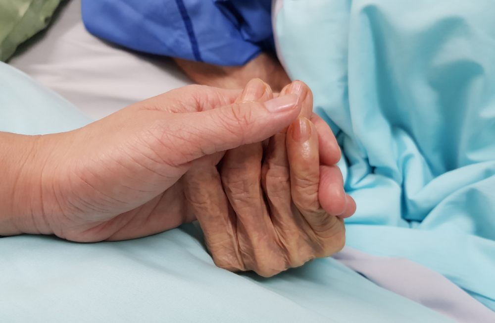 20230822014944 Woman holding an elderly palliative pati