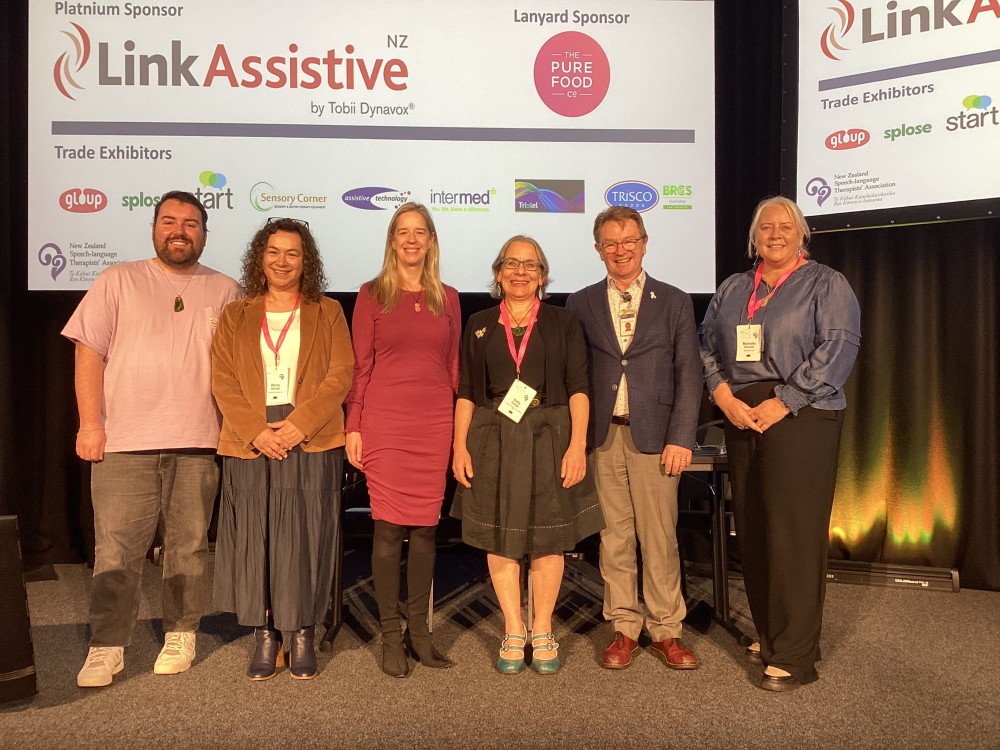 Caption  The Day 2 keynote panel Mary Woodward Michelle Bonetti Dr Russell Wills Sally Kedge and facilitators Kerry Heslop and Ryan dos Santos Meechan discussed SLT within the justice system v3. A video con 1